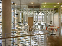 Daylight and LED ‘butterfly’ Chandeliers create a friendly atmosphere in the atrium and in the classrooms while minimizing energy demand and reliance on extensive artificial lighting. - Photo Credit: Brad Feinknopf