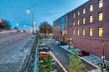 The small parking lot to the north is paved with pervious pavement to encourage direct ground infiltration during rainfall - Photo Credit: Jeff Amram